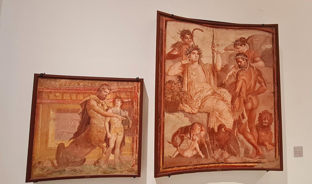 Herculaneum Augusteum. April 2023. 
No.3 and 4 on above descriptive card – Achilles and Chiron, inv. 9109, and Hercules and Telephus, inv. 9008.
On display in “Campania Romana” gallery in Naples Archaeological Museum.  Photo courtesy of Giuseppe Ciaramella.
