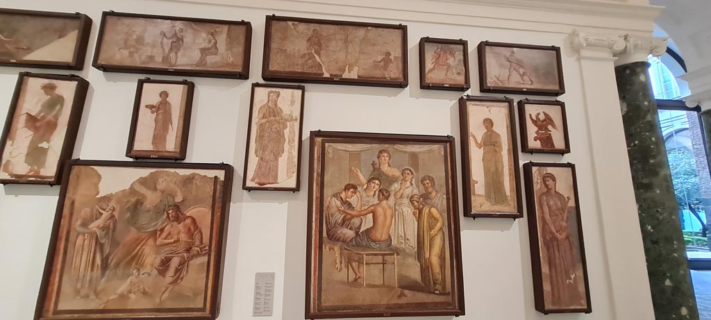 Herculaneum Augusteum. April 2023. Paintings on side wall. 
On display in “Campania Romana” gallery in Naples Archaeological Museum.  Photo courtesy of Giuseppe Ciaramella.
