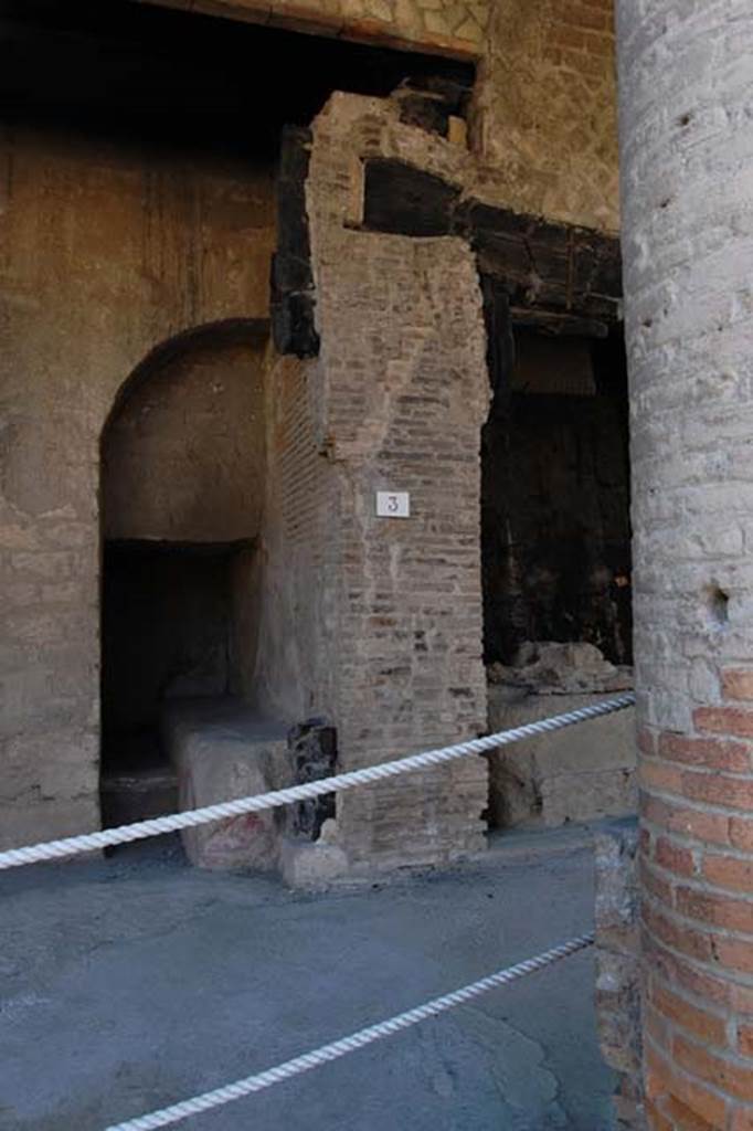 Decumanus Maximus, Herculaneum. May 2011. 
Looking towards east side of doorway, with bench outside of number 3.
Photo courtesy of Nicolas Monteix.
