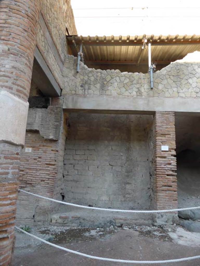 Decumanus Maximus, Herculaneum, September 2015. 
Building on north side of the Decumanus Maximus, doorway numbered 6.
