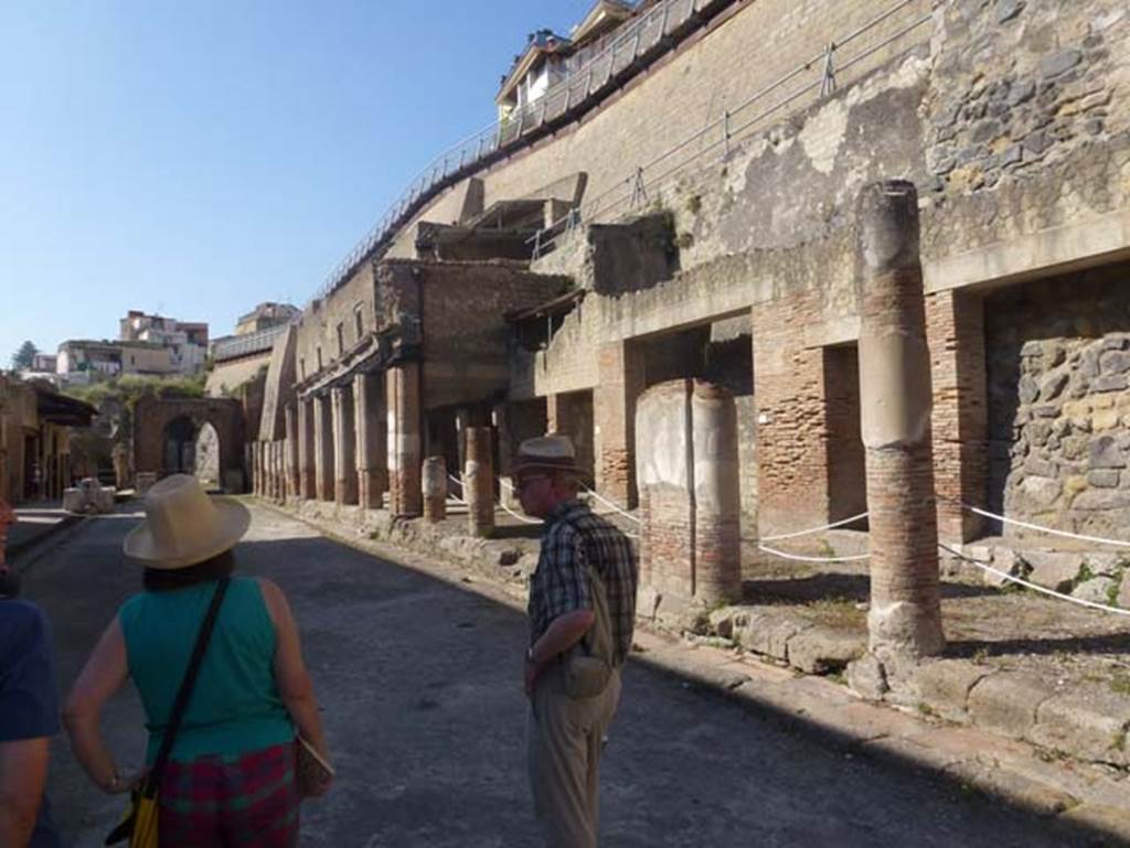Decumanus Maximus, Herculaneum, June 2012. Looking west along north side, from near doorway numbered 10.  Photo courtesy of Michael Binns.

