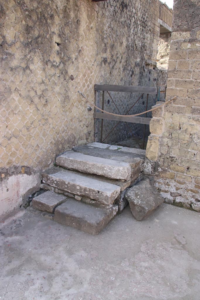 II.1 Herculaneum, October 2023. 
Steps and doorway in south-east corner of atrium. Photo courtesy of Klaus Heese.
