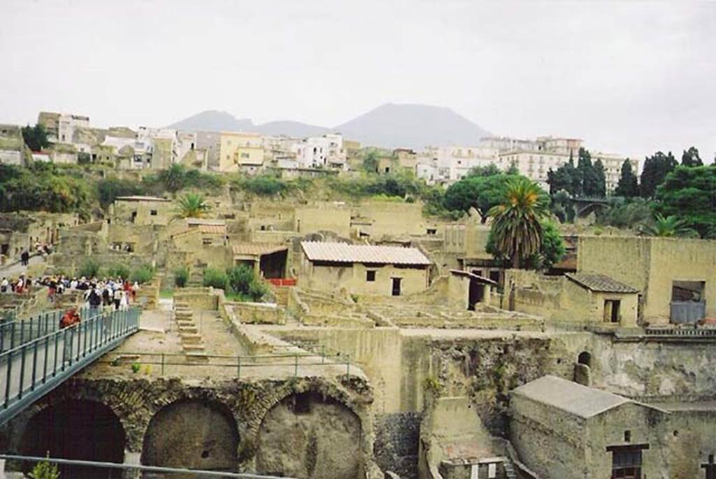 III.1/2/18/19, Herculaneum, October 2001. Looking north from access roadway towards upper and lower rooms, in centre.  Note the access bridge led onto the southern large terrace with remains of collapsed massive square pilasters. Photo courtesy of Michael Binns.
