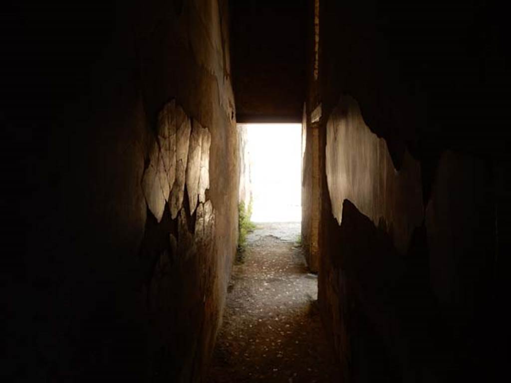 III.16, Herculaneum, May 2018. Looking west along corridor 6, on south side of atrium. 
Photo courtesy of Buzz Ferebee

