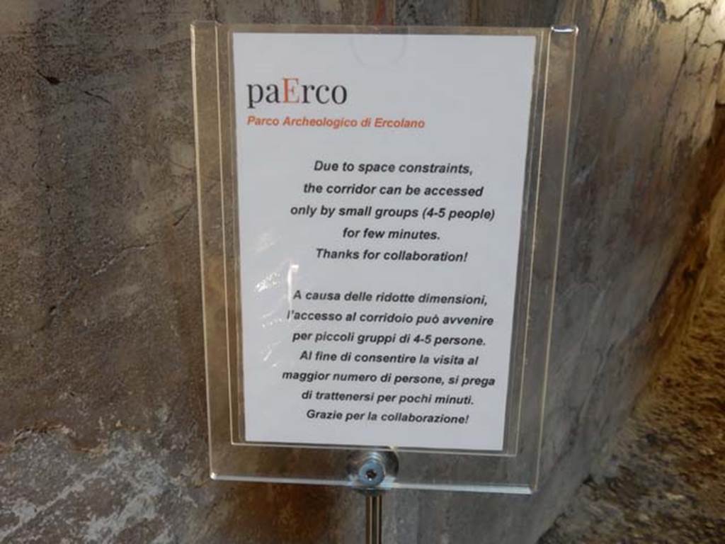 III.16, Herculaneum, May 2018. Information notice, for users of the corridor. Photo courtesy of Buzz Ferebee