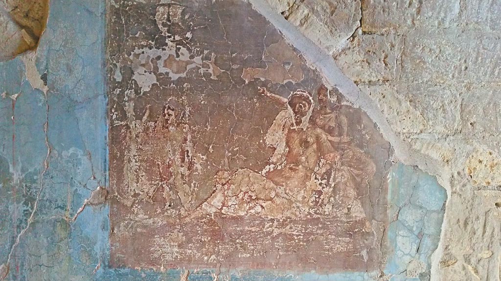 IV.4 Herculaneum. Photo taken between October 2014 and November 2019. 
Room 8, central wall painting from south wall of oecus, wall painting of Ariadne abandoned on the island of Naxos as the ship of Theseus takes off.
Photo courtesy of Giuseppe Ciaramella.
