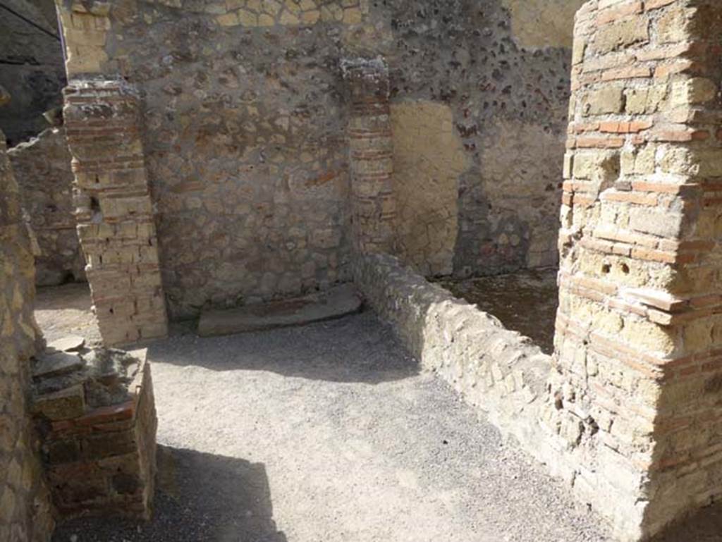 IV.4, Herculaneum, October 2014. Looking south from doorway of room 15, towards courtyard 12, on right.  Photo courtesy of Michael Binns.
