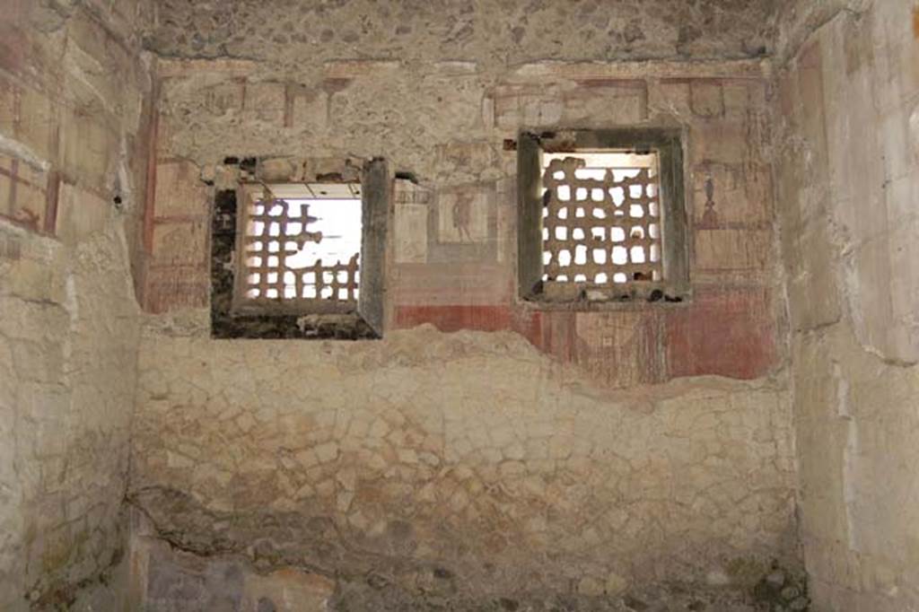 IV.4 Herculaneum. May 2011. Room 19, west wall of biclinium. Photo courtesy of Nicolas Monteix.