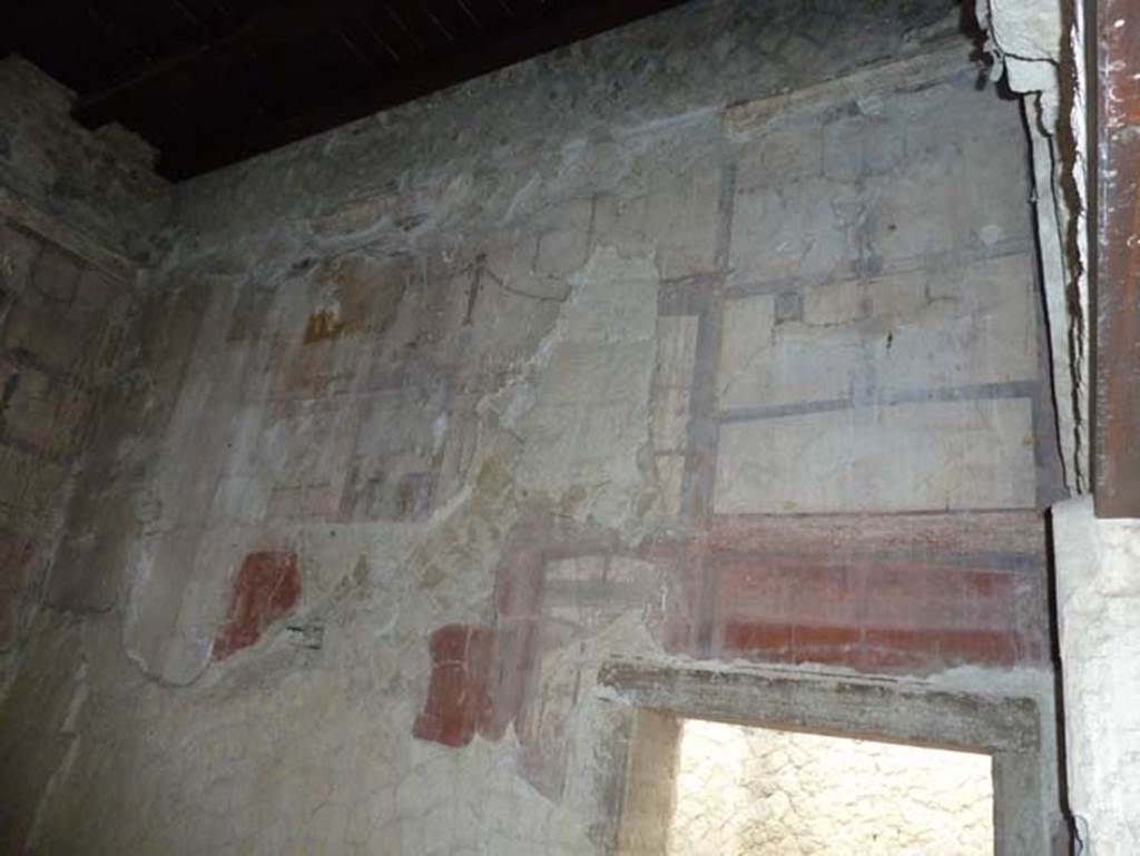IV.4 Herculaneum. September 2015. Room 19, north wall and doorway to room 18.
