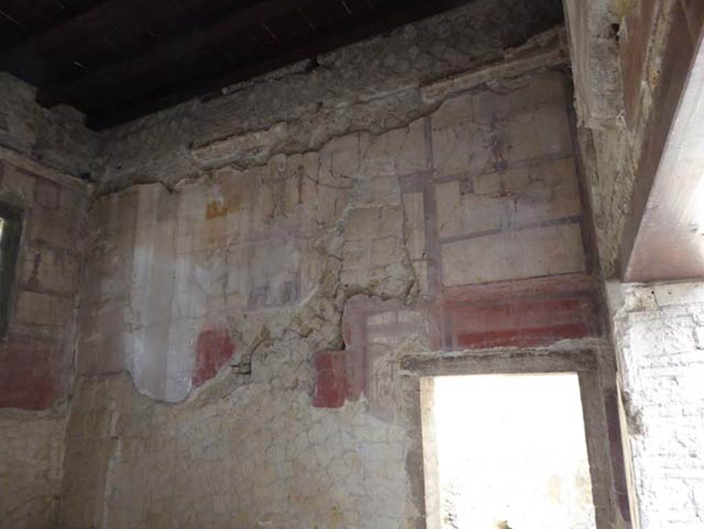 IV.4 Herculaneum. October 2014. Room 19, north wall and doorway to room 18.
Photo courtesy of Michael Binns.

