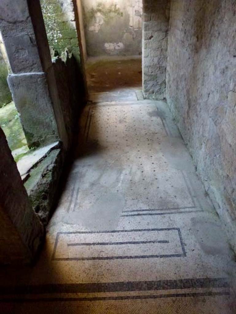 IV.4 Herculaneum. October 2012. Corridor 21, looking north at east end towards doorway to room 23.  Photo courtesy of Michael Binns.
