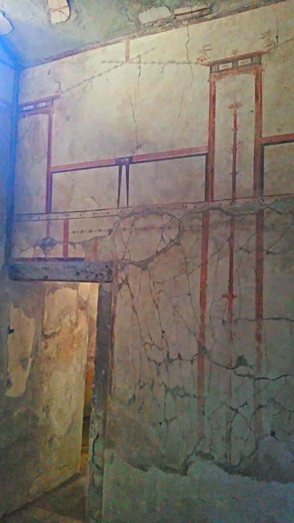 IV.4 Herculaneum. Photo taken between October 2014 and November 2019. 
Room 23, west wall of anteroom, with doorway to room 24.
Photo courtesy of Giuseppe Ciaramella.
