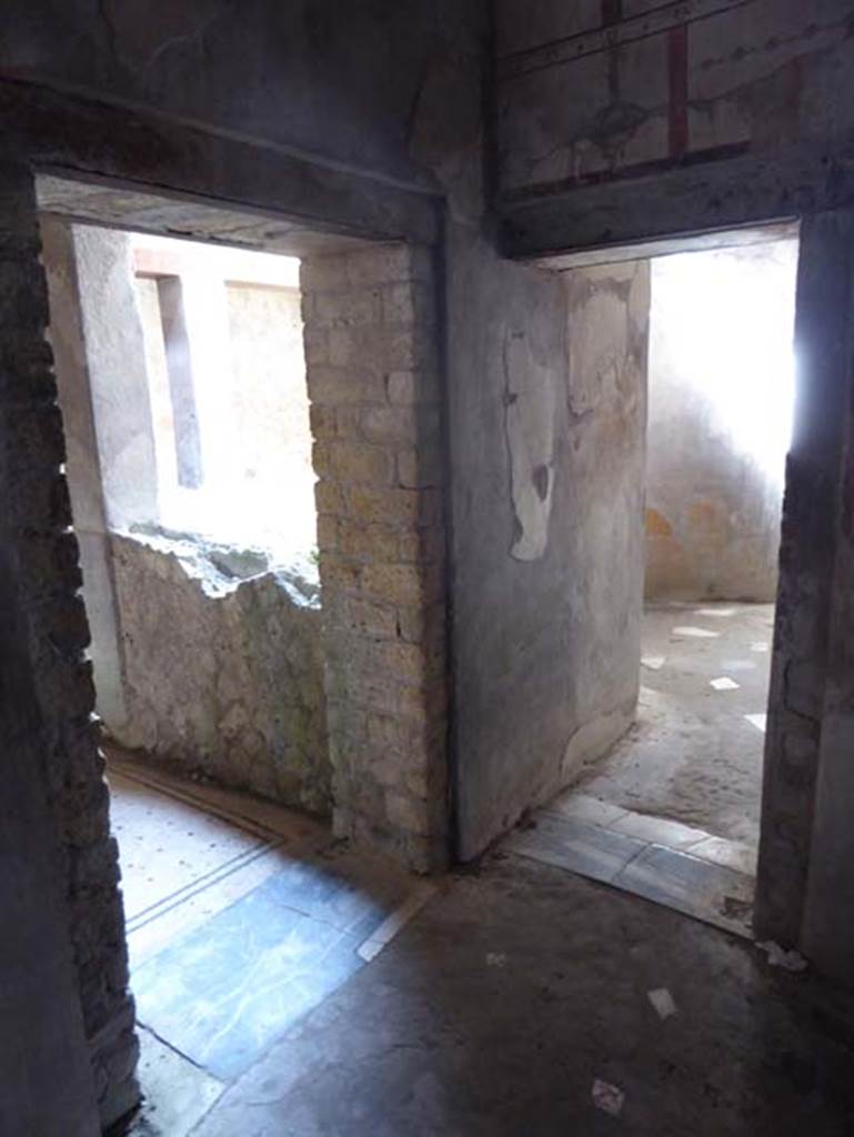 IV.4 Herculaneum. October 2014. Room 23, doorway to corridor 21, on left, and doorway from room 24, on right.  Photo courtesy of Michael Binns.
