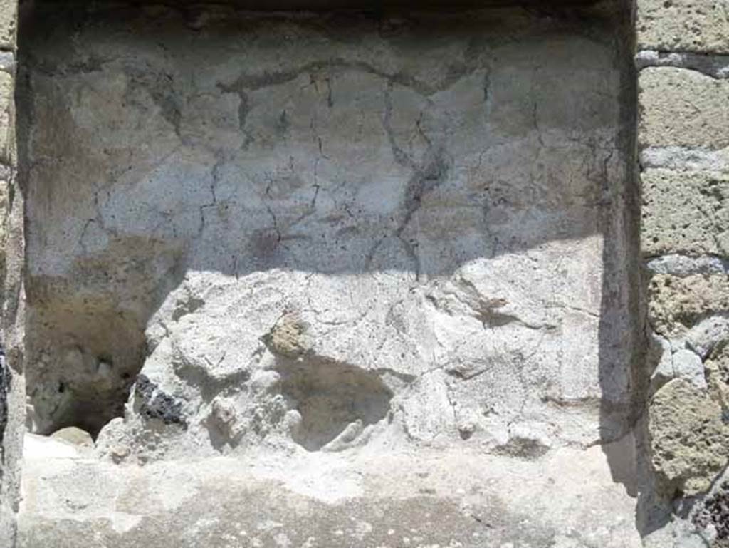 IV.8, Herculaneum, May 2010. Room 4, niche in north wall.