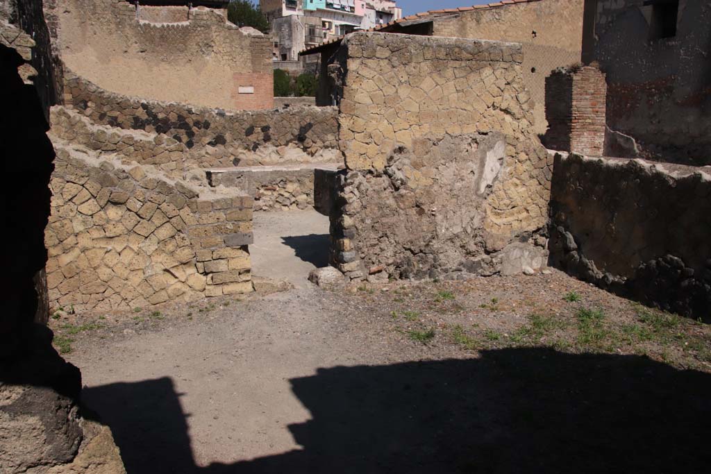 IV.10, Herculaneum, September 2021. 
Large room - looking towards doorway in west wall leading into shop-room. Photo courtesy of Klaus Heese.
