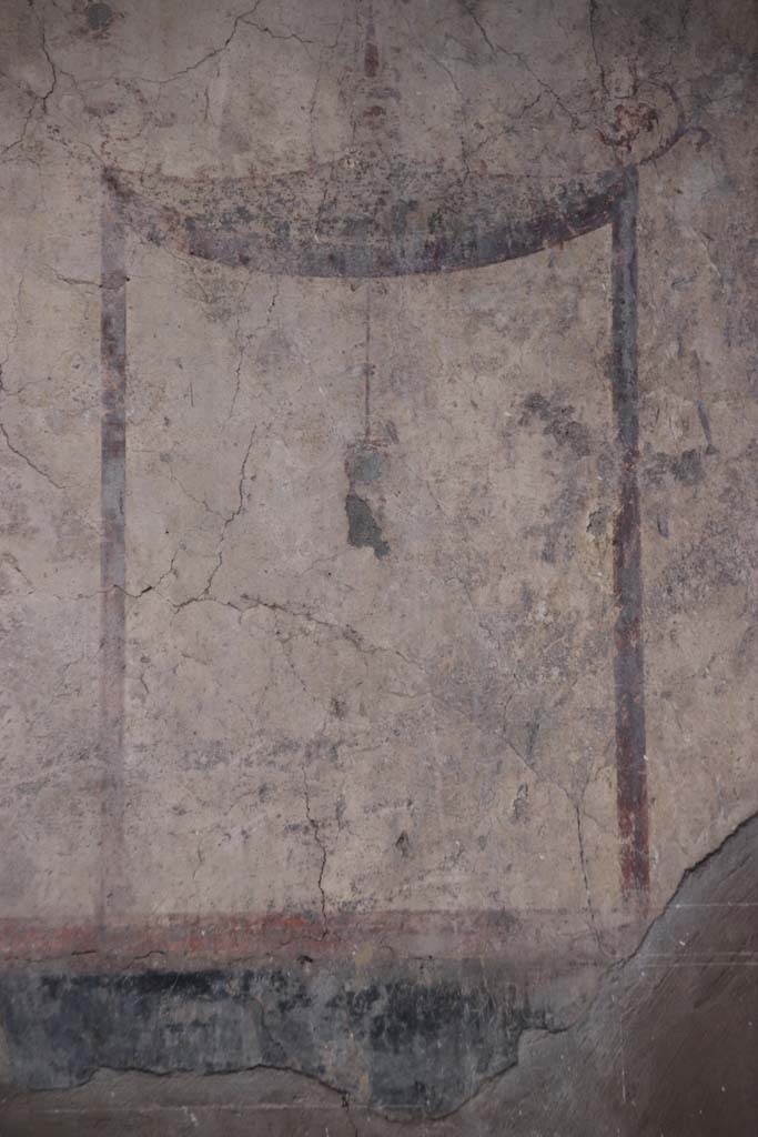 IV.21, Herculaneum. October 2020. 
Room 24, detail of painted decoration from upper west wall above doorway to room 5, in atrium. Photo courtesy of Klaus Heese.
