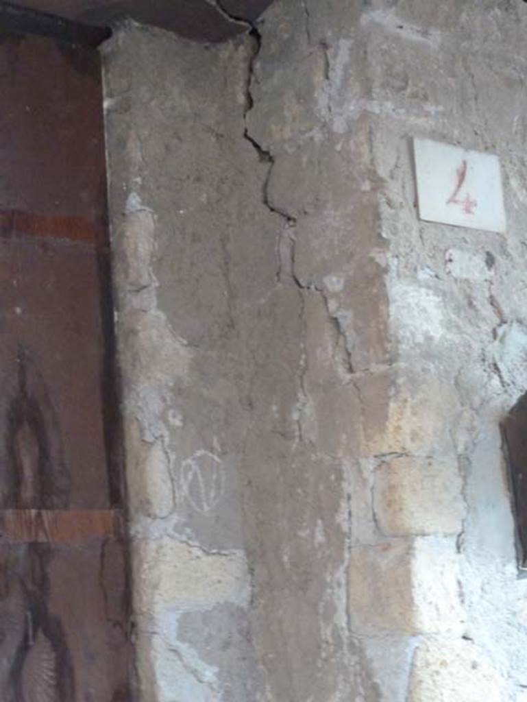 Ins. V 4, Herculaneum, September 2015. South side of doorway, with identification number. 