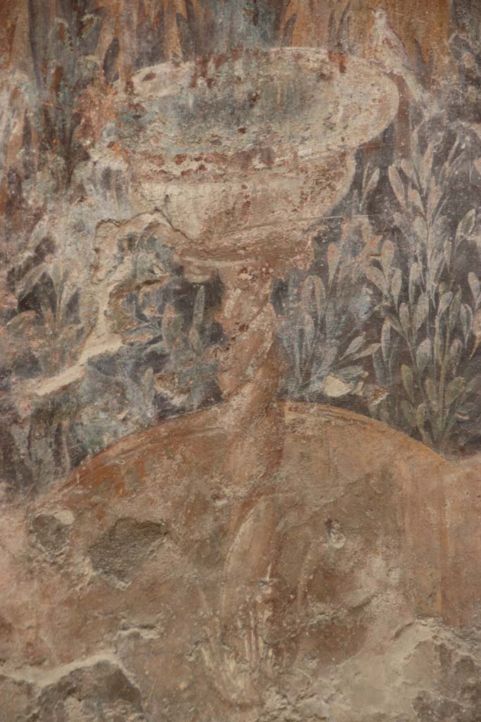 V.7 Herculaneum, September 2017. 
Detail of painted fountain from garden painting on south end of east wall of internal courtyard. 
Photo courtesy of Klaus Heese. 
