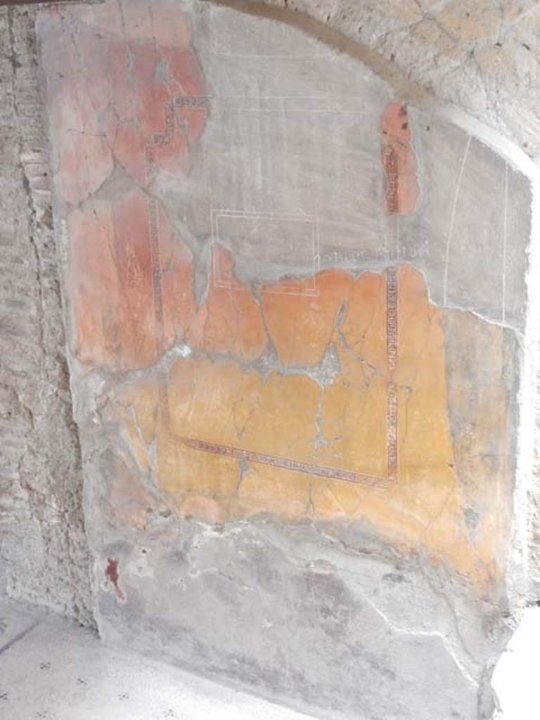 V.8 Herculaneum, May2018. Room 3, detail of painted decoration on north wall of small tablinum. 
Photo courtesy of Buzz Ferebee.
