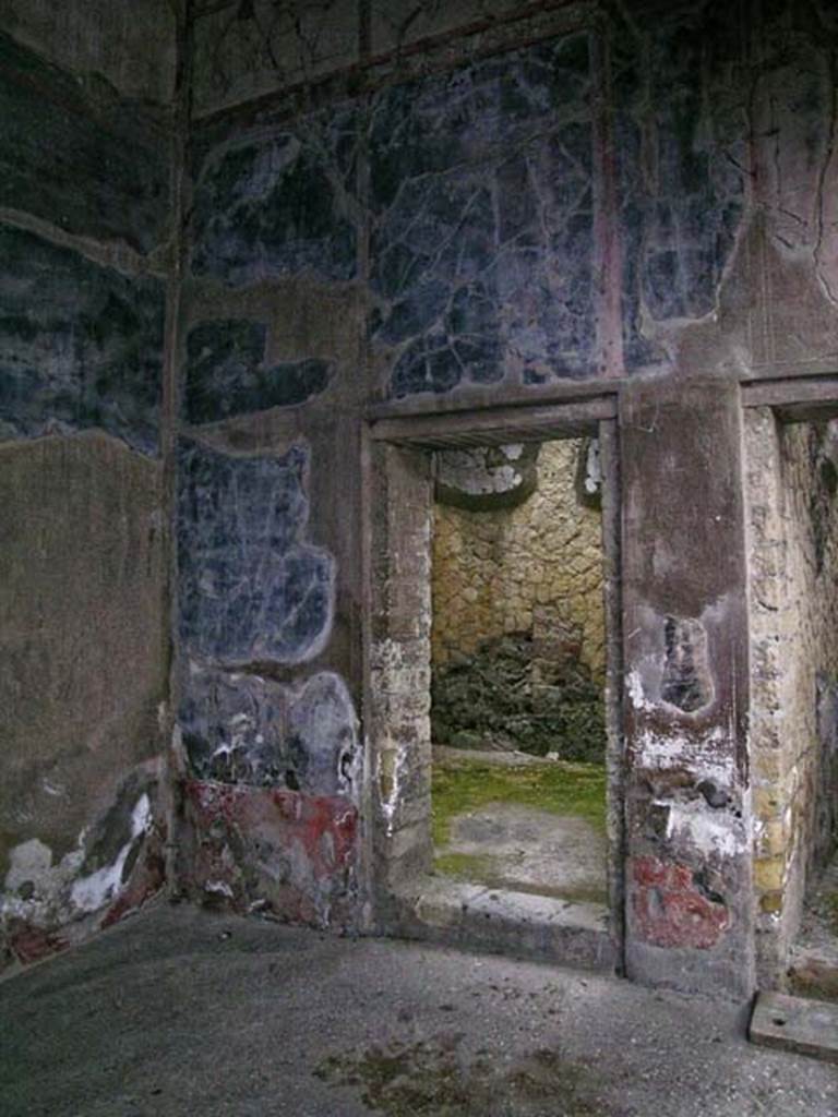 V.35, Herculaneum. May 2005.  Doorway to cubiculum 5, in north wall of Ala 10.
Photo courtesy of Nicolas Monteix.

