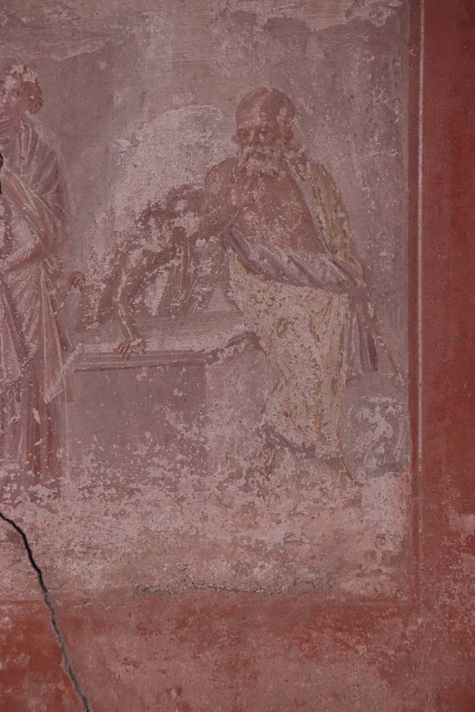 V.35 House of Great Portal. October 2020. 
Triclinium 1, detail from central wall painting of Silenus, seated between two satyrs.  
Photo courtesy of Klaus Heese.
