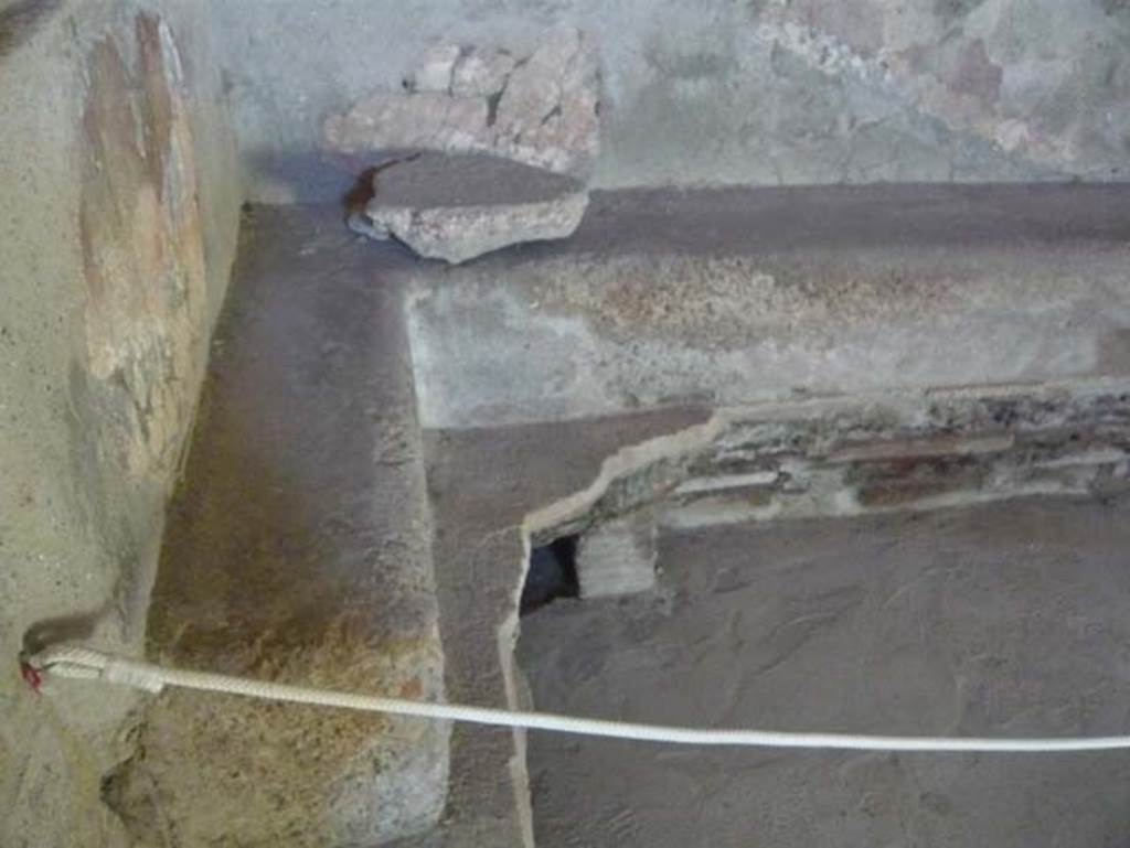 VI.1, Herculaneum. August 2013. Collapsed hollow floor in tepidarium in north-west corner.  Photo courtesy of Buzz Ferebee.
