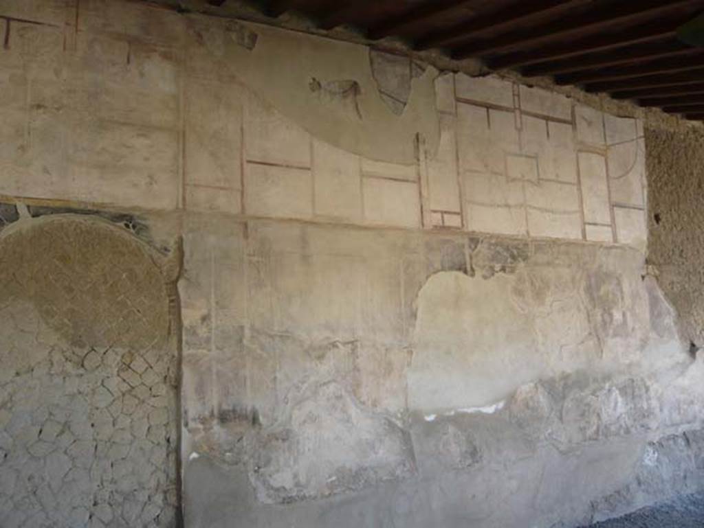 VI.1/7, Herculaneum.  August 2013. East wall of east portico. Photo courtesy of Buzz Ferebee.