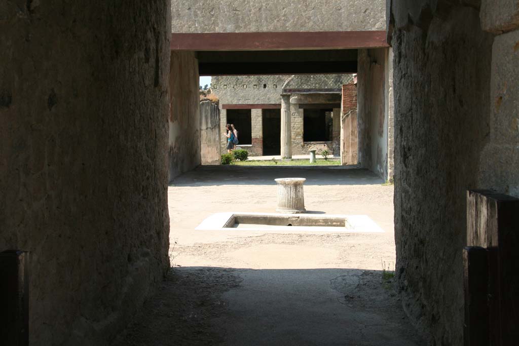 VI.13 Herculaneum. April 2011. Looking south from vestibule/entrance corridor.
Photo courtesy of Klaus Heese.
