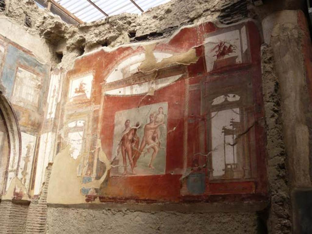 VI.21 Herculaneum. August 2013. West wall with wall painting of Hercules with Achelous and Deianeira.  Photo courtesy of Buzz Ferebee.
