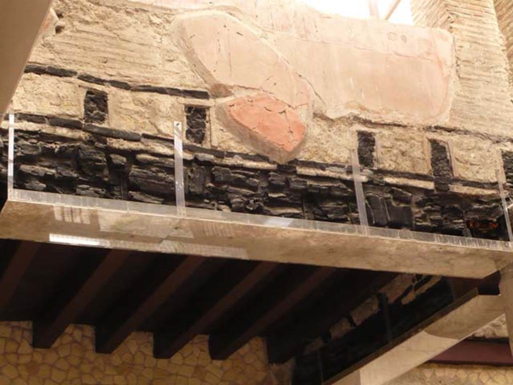 Ins.VI.21, Herculaneum.  May 2009. Detail of carbonized beams from upper floor. 
Photo courtesy of Buzz Ferebee.
