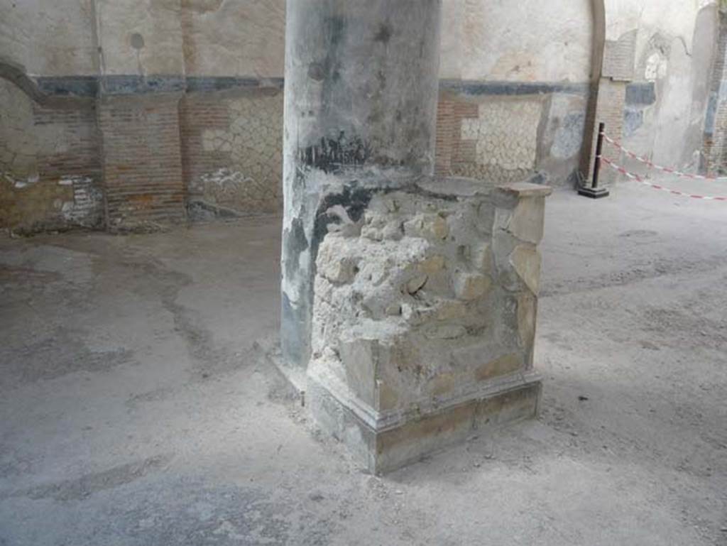 VI.21 Herculaneum. August 2013. Looking east (left) towards statue base, and south-east corner. 
On one of the two columns the graffito was found which mentioned the Curia Augustales. Photo courtesy of Buzz Ferebee.
According to Wallace-Hadrill, the column bearing no less than three graffiti, was the first column on the right, (west side).
See Wallace-Hadrill, A. (2011). Herculaneum, Past and Future. London, Frances Lincoln Ltd., (p.180)
