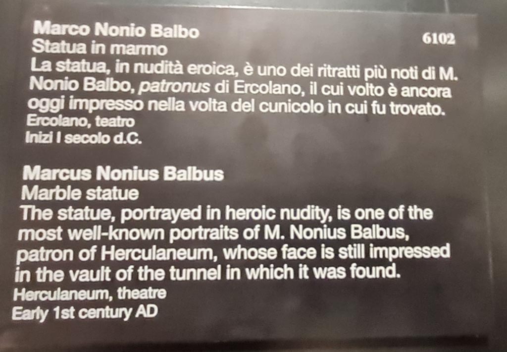 Herculaneum theatre. April 2023. Descriptive card for heroic nude marble statue of Marcus Nonius Balbus, Inventory number 6102. Photo courtesy of Giuseppe Ciaramella.