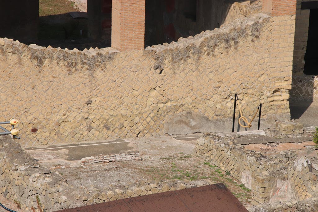 Ins. Or. I.1, Herculaneum. October 2023. 
Looking towards exterior east wall of room 6, corridor from collapsed loggia, across centre, leading to room m, on right.
Photo courtesy of Klaus Heese.
