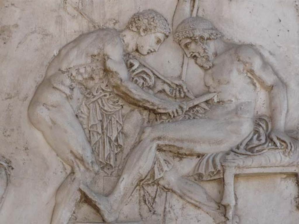 Ins. Or.I.2, Herculaneum. August 2013. Detail from plaster cast showing Achilles healing Telephus. The myth was that Telephus could only be healed by the rust of Achilles’ spear, the spear which had wounded him. Photo courtesy of Buzz Ferebee.  

