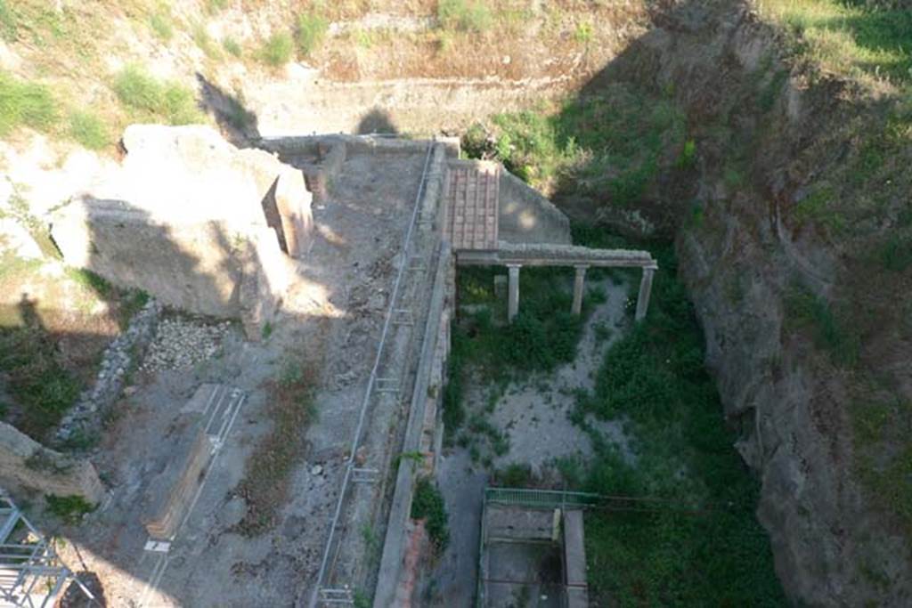 Ins. Orientalis II 4, Herculaneum Palaestra. July 2010. Looking east from roadway above. 
Photo courtesy of Michael Binns.

