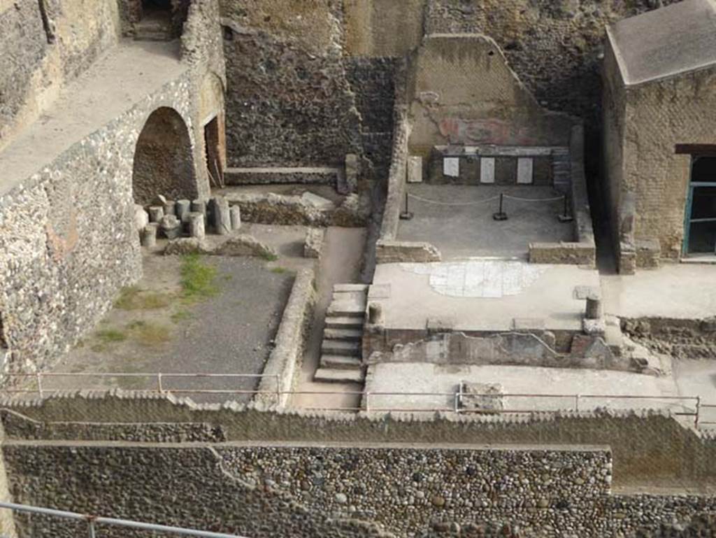 Herculaneum, October 2014. Sacello dei Quattro dei. Shrine of the four gods. Sacred Area terrace.  Looking north from access roadway. Photo courtesy of Michael Binns.
