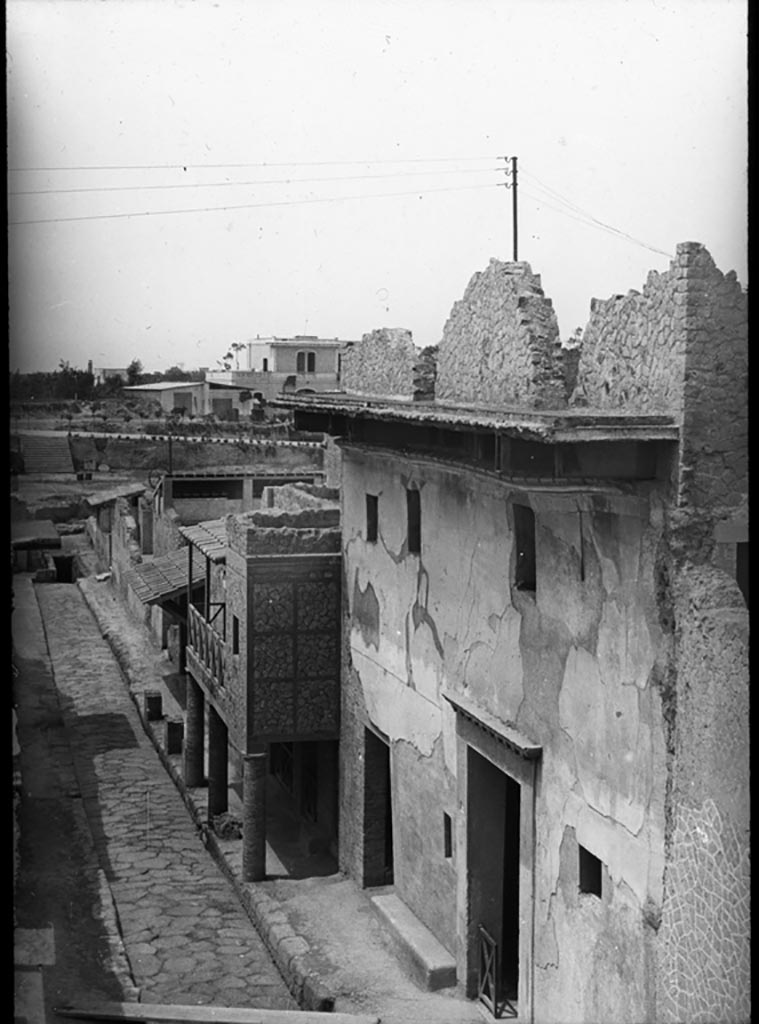 Cardo IV Inferiore, Herculaneum. 1932. P.C. H.36. Photo by P. C. 
Looking south along the west side of Cardo IV Inferiore, towards doorway of III.11, the House of the Wooden Partition,
Used with the permission of the Institute of Archaeology, University of Oxford. 
File name instarchbx92im005 Resource ID 41154.
See photo on University of Oxford HEIR database