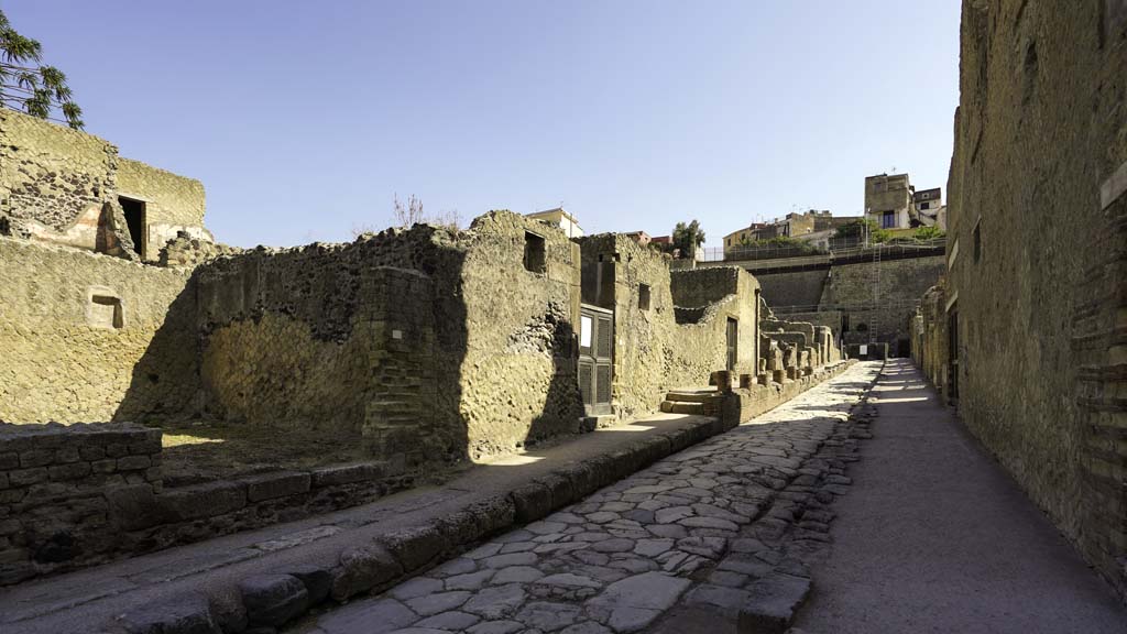 Cardo V, Herculaneum, August 2021. 
Looking north along Ins. V, on west side of roadway, with V.32, on left. Photo courtesy of Robert Hanson.
