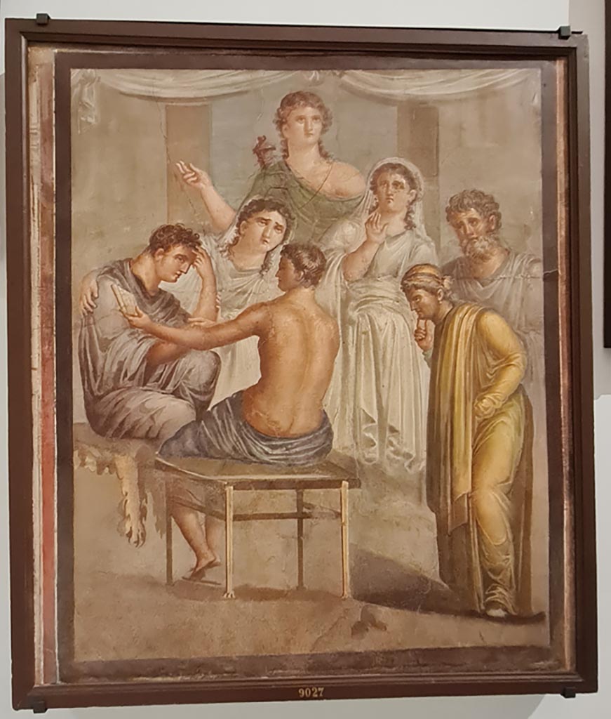 Herculaneum Augusteum. April 2023. Painting from lower row, on side wall, showing Admetus and Alcestis, inv. 9027. 
On display in “Campania Romana” gallery in Naples Archaeological Museum.  Photo courtesy of Giuseppe Ciaramella.
