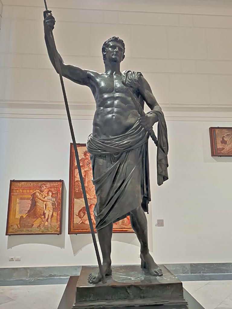 Herculaneum Augusteum. April 2023. 
Detail of bronze statue of Augustus, inv. 5595. Photo courtesy of Giuseppe Ciaramella.

