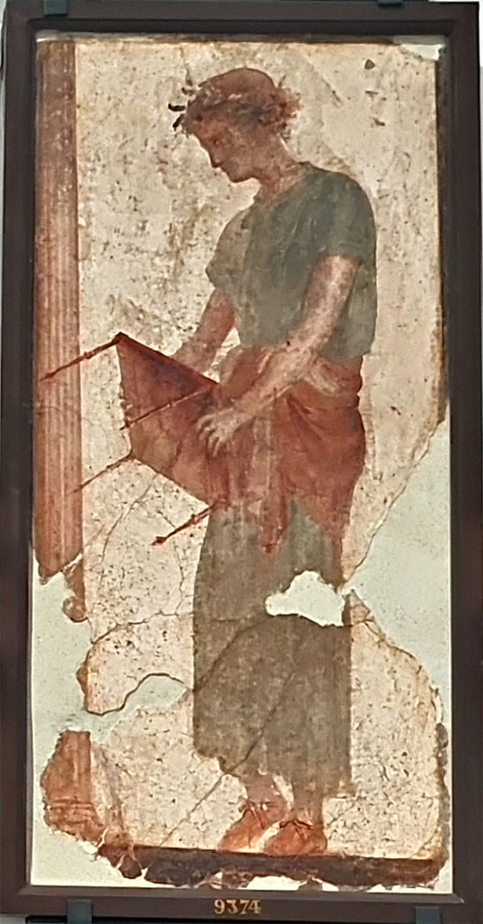 Herculaneum Augusteum. Found 7th January 1740. Assistant.
Now in Naples Archaeological Museum. Inventory number 9374.
See Le Antichità di Ercolano esposte Tomo 4, Le Pitture Antiche di Ercolano 4, 1765, Tav 1, 1.
