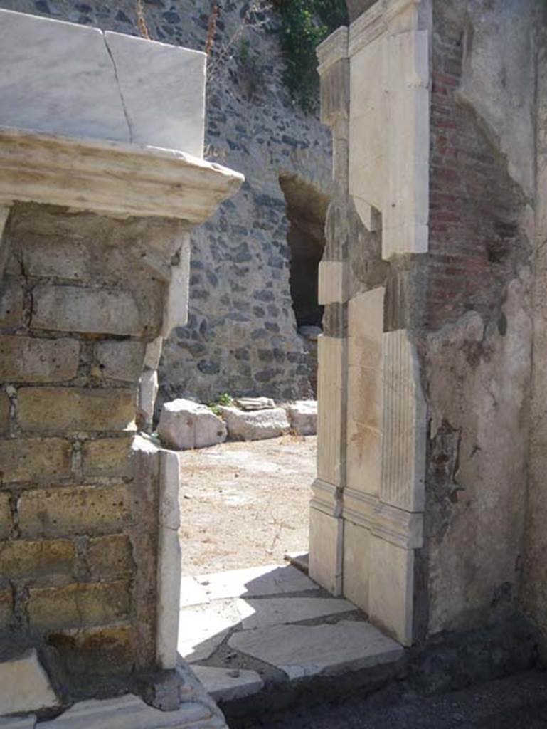 Herculaneum. August 2013. Looking north-east between statue base and structure.
Photo courtesy of Buzz Ferebee.
