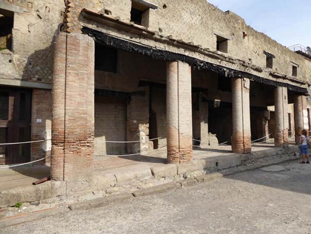 Decumanus Maximus, Herculaneum, July 2015. Building on north side of the Decumanus Maximus, doorway numbered 2, and upper floors. Photo courtesy of Michael Binns.
