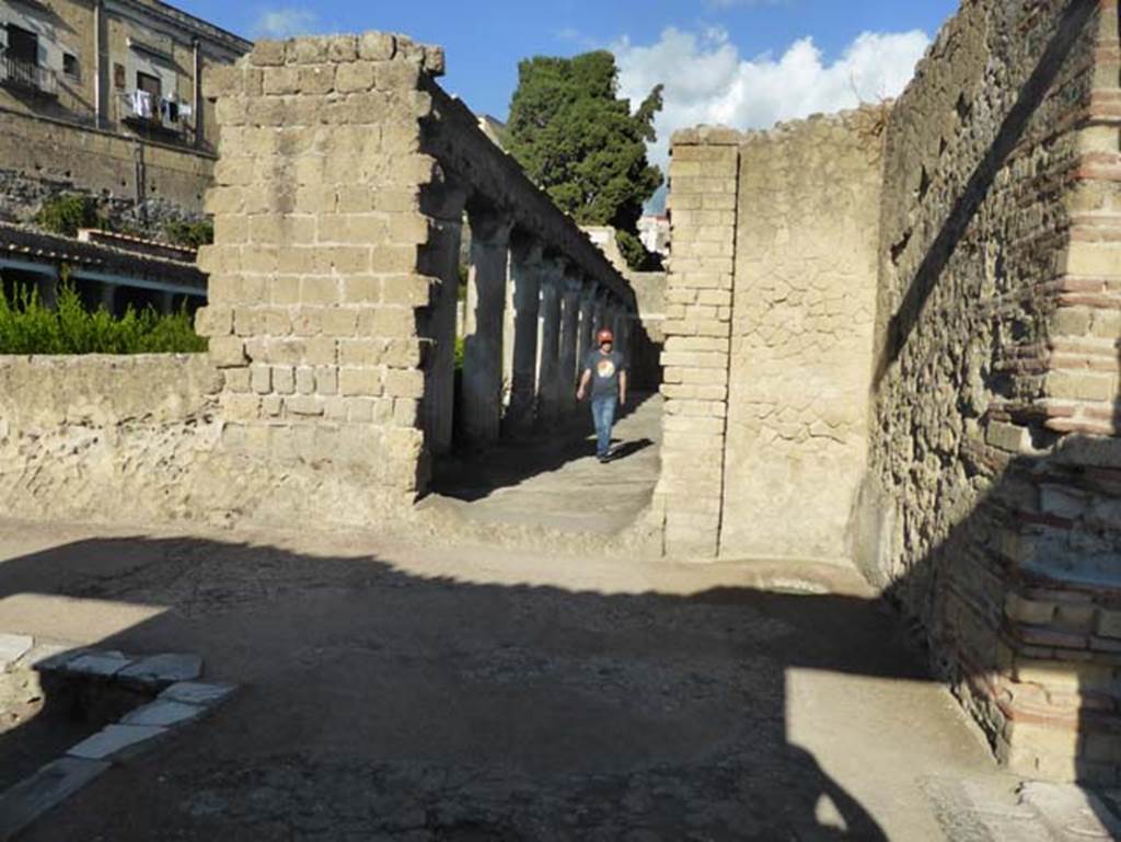II.1 Herculaneum, August 2021. 
Modern doorway linking to peristyle of II.2 Casa d’Argo, on north side of atrium. Photo courtesy of Robert Hanson
