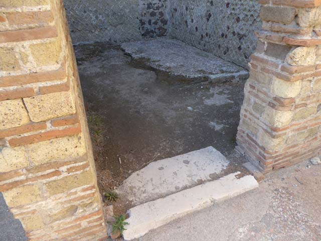II.2 Herculaneum, September 2015. Threshold of doorway of room in north-east corner from peristyle. Looking west.  Photo courtesy of Michael Binns.

