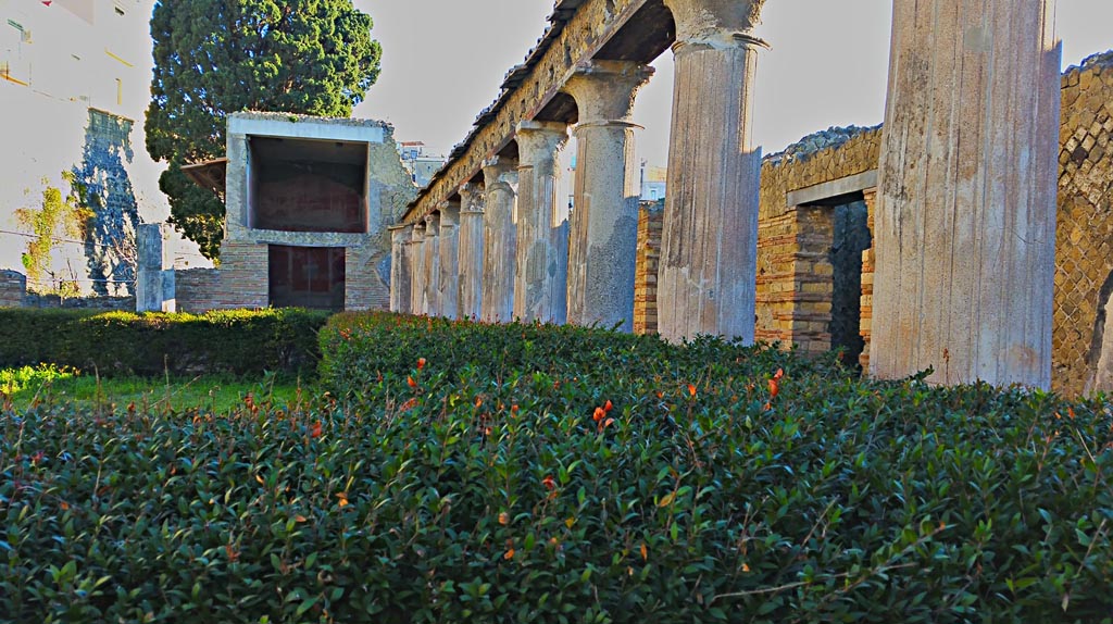 II.2 Herculaneum, photo taken between October 2014 and November 2019. 
Looking along east portico towards room on north side of peristyle. Photo courtesy of Giuseppe Ciaramella.

