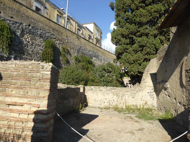 II.2 Herculaneum, September 2019. Looking towards west wall of exedra, at the north end (on right) was a doorway into a corridor/room. 
Photo courtesy of Klaus Heese.
