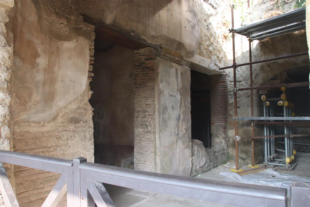 II.2 Herculaneum, October 2023. 
Looking west through doorway towards rooms on west side, no longer accessible. Photo courtesy of Klaus Heese.
