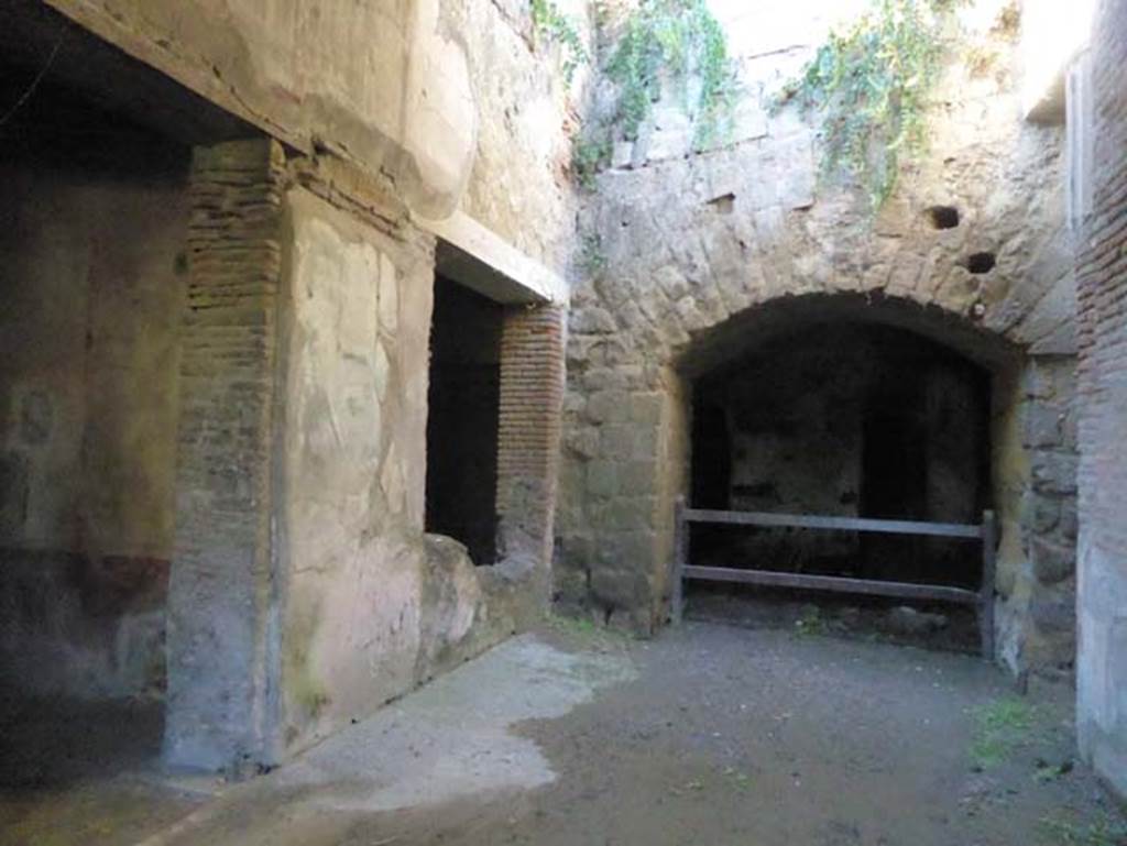 II.2 Herculaneum, September 2015. Looking west, on the right would have been the way to other living rooms, bedrooms and a terrace overlooking the sea, none of which are accessible.
