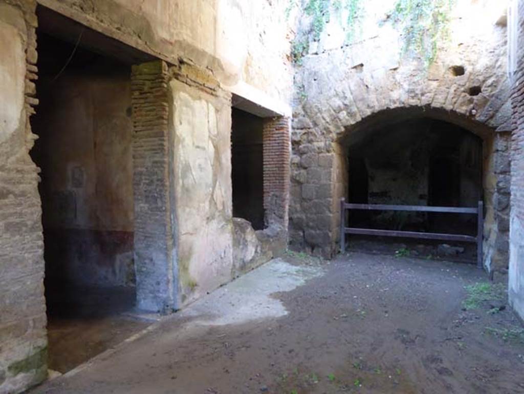 II.2 Herculaneum, September 2015. Looking towards rooms on south side from doorway in west portico. Photo courtesy of Michael Binns.
